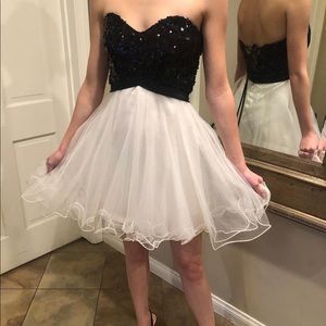 Black sequins and white tulle cocktail dress